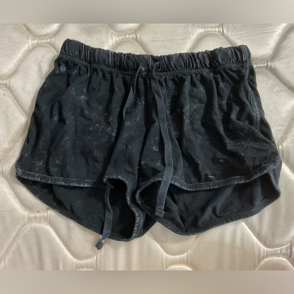 Black marbelish shorts.